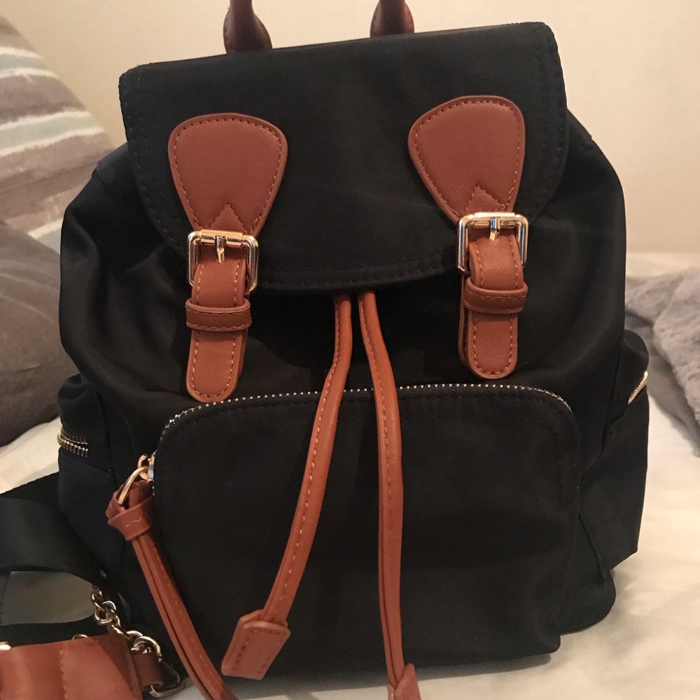 Black and brown nylon backpack